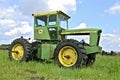 Four wheel drive John Deere tractor missing an engine