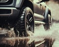 Four-wheel drive off road car passing through a flooded road with a large puddle. Royalty Free Stock Photo