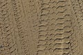 Four wheel drive tracks in soft sand texture Royalty Free Stock Photo