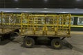 Four - wheel trailer on the railway platform.