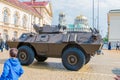 Four-wheeled armored vehicles commando select on military hardware parade.