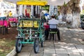 Four wheeled bike on the street in downtown