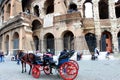 Four-Wheeled-Carriage in front of Roman Colosseum