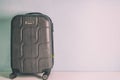 Four wheeled hard shell black suitcase Royalty Free Stock Photo