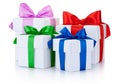 Four White boxs tied with colored satin ribbons bow Isolated Royalty Free Stock Photo