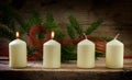 Four white candles, two of them burning on the second advent, de