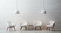 Four white chairs in front of a white brick wall, in the style of minimalist Royalty Free Stock Photo