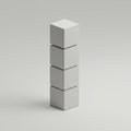 Four white cubes stacked vertically on a plain, neutral background. Each cube is Royalty Free Stock Photo