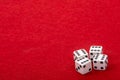 Four White Dice with Value 6 on Red Velvet Playing Table - Gambling and Game Concept for Luck and Chance Games Royalty Free Stock Photo