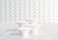 Four white podiums with abstract white pearl wall. Stand to show products.