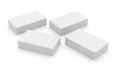 Four white rectangular blocks arranged in a diagonal formation on a plain background Royalty Free Stock Photo