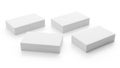 Four white rectangular blocks arranged in a loose square formation on a plain background Royalty Free Stock Photo