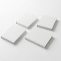 Four white rectangular blocks arranged in a square formation on a white background Royalty Free Stock Photo