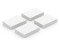 Four white rectangular objects arranged in a square formation on a plain white background Royalty Free Stock Photo