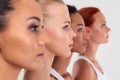 Four women standing in a raw