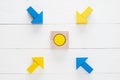 Four wooden arrows converge towards the center target Royalty Free Stock Photo