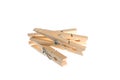 Four wooden clothespins