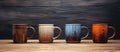 Four wooden cups sit on a table, part of the tableware collection Royalty Free Stock Photo