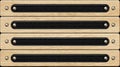 Four wooden panels, each with a centered black leather strip and silver rivets Royalty Free Stock Photo