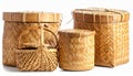 Four Woven Bamboo Baskets of Various Sizes and Shapes on White container storage Royalty Free Stock Photo
