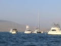 Four yachts and one catamaran in Ancon