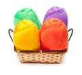 Four yarn skeins in yellow, orange, green, purple colors Royalty Free Stock Photo