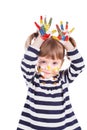 Four-year girl with hands soiled in a paint. Royalty Free Stock Photo