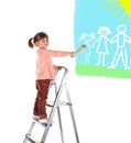 Four-year girl stand on a ladder and draws a pictu Royalty Free Stock Photo