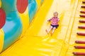 Four-year-old kid playing on a trampoline