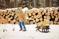 Boy alone in the winter in the forest