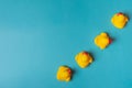 Four yellow rubber ducks on a blue background. Bath concept. Copy space, flat lay Royalty Free Stock Photo