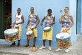 Four Young Brazilian Men Standing Drumming Salvador