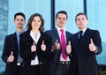 Four young businesspersons in formal clothes Royalty Free Stock Photo