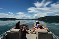 Four young women on pontoon boat on Flathead Lake, Montana. Royalty Free Stock Photo