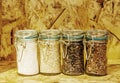 Foure race of rice varieties in glass: brown rice, mixed wild ri Royalty Free Stock Photo