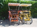 Fourseater bicycles orange/yellow Royalty Free Stock Photo