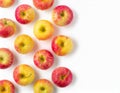 Fourteen Suncrisp Apples arranged in a pattern on a white background shot from above