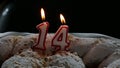 Fourteenth birthday cake with candles