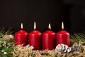 Fourth advent candle burning Royalty Free Stock Photo