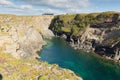 Fox Cove Cornwall coast between Treyarnon and Porthcothan with clear turquoise blue sea Royalty Free Stock Photo