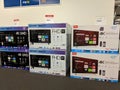 TCL and Sharp Roku TVs on display at Best Buy