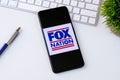 Fox Nation app logo on a smartphone screen.