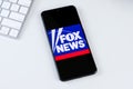 Fox News app logo on a smartphone screen. Royalty Free Stock Photo