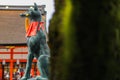 Fox statue at the Fushimi inari taisha shrine Royalty Free Stock Photo