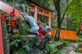 Fox Statue Water fountain in Fushimi Inari Shrine - Kyoto, Japan Royalty Free Stock Photo