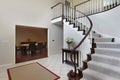 Foyer with curved staircase