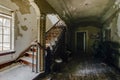 Foyer with Ornate Staircase - Abandoned Mansion