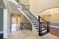 Foyer with spiral staircase Royalty Free Stock Photo