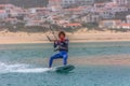 View of a professional sportsman practicing extreme sports Kiteboarding at the Obidos lagoon, Foz do Arelho, Portugal Royalty Free Stock Photo