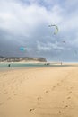 View of a professionals sports practicing extreme sports Kite-boarding at the Obidos lagoon, Foz do Arelho, Portugal
